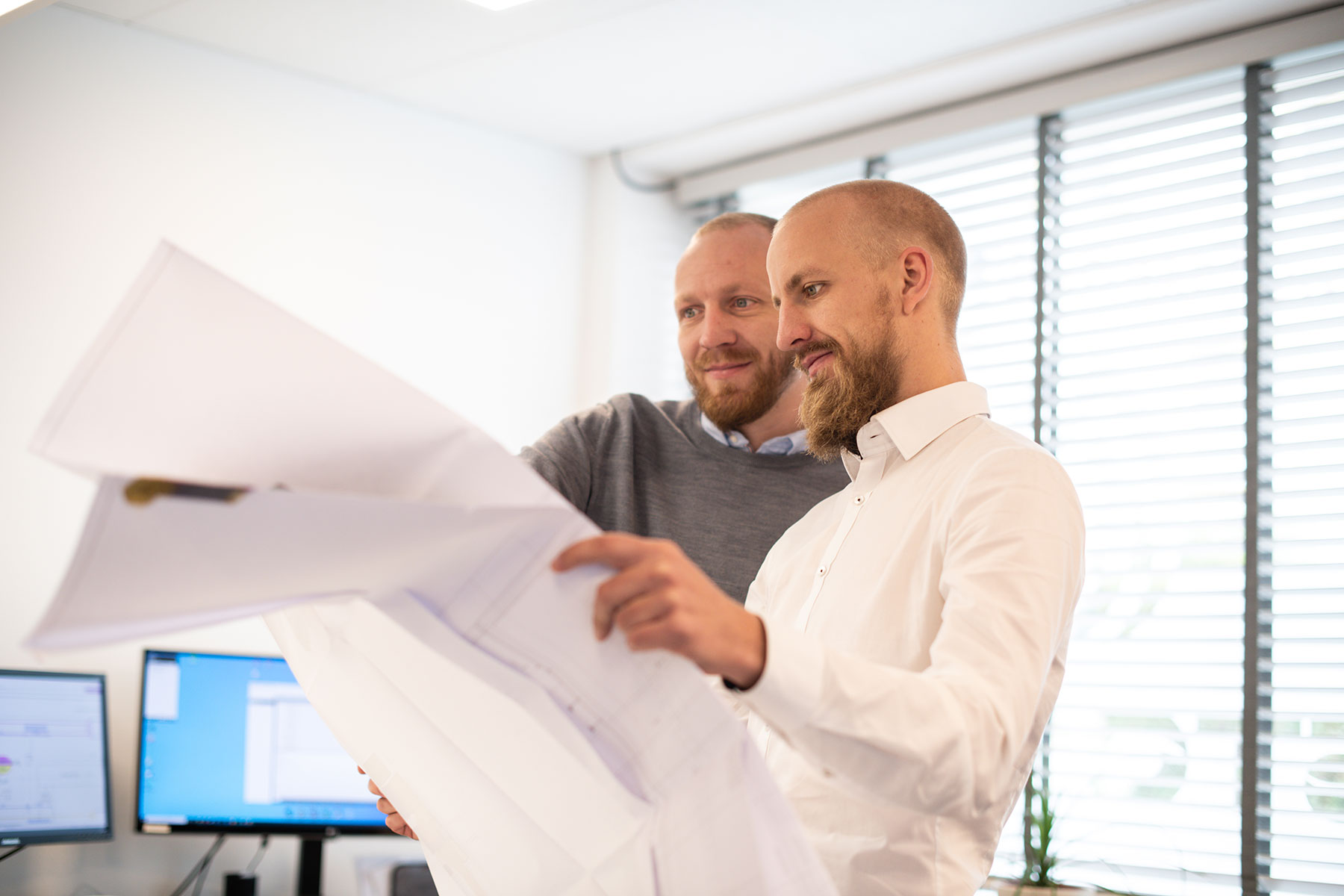 haustechnik_stocker_geschaeftsfuehrer_mit_plan